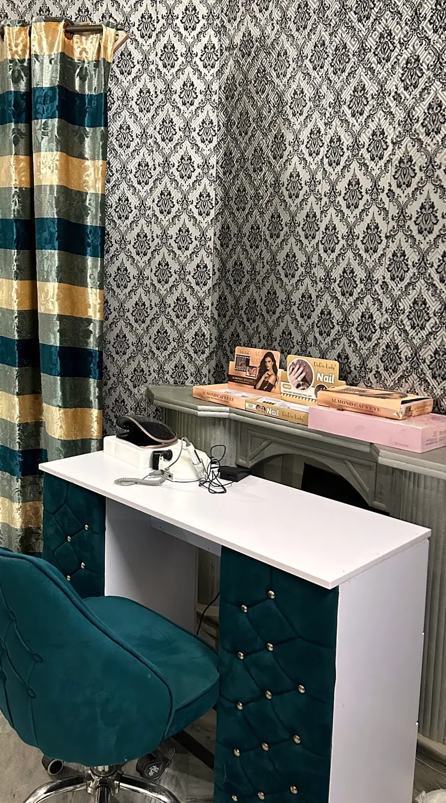 A work desk by the curtains